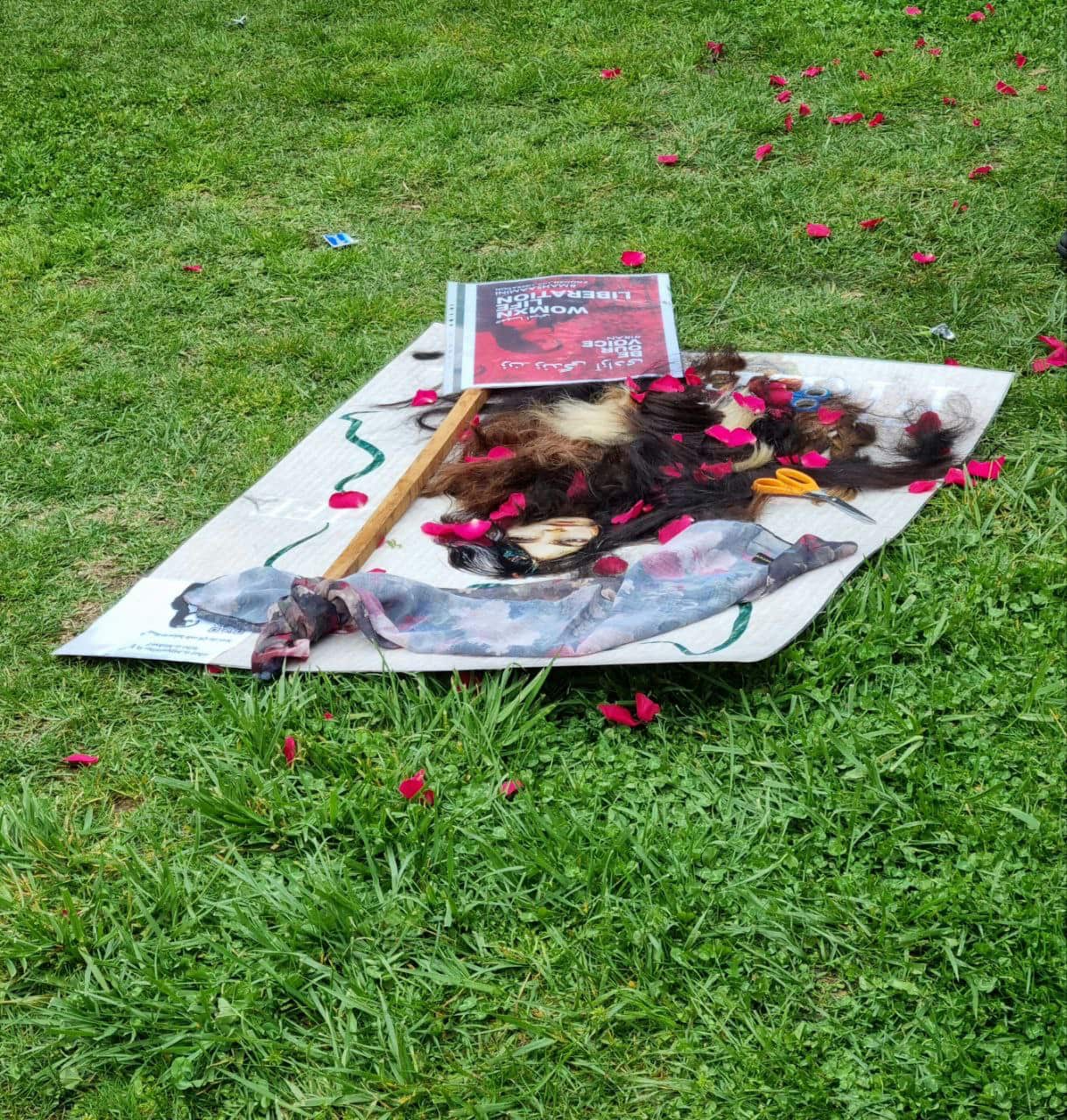 A number of women protested by cutting their hair