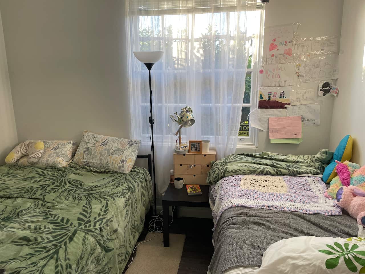 Two beds close together in a bedroom