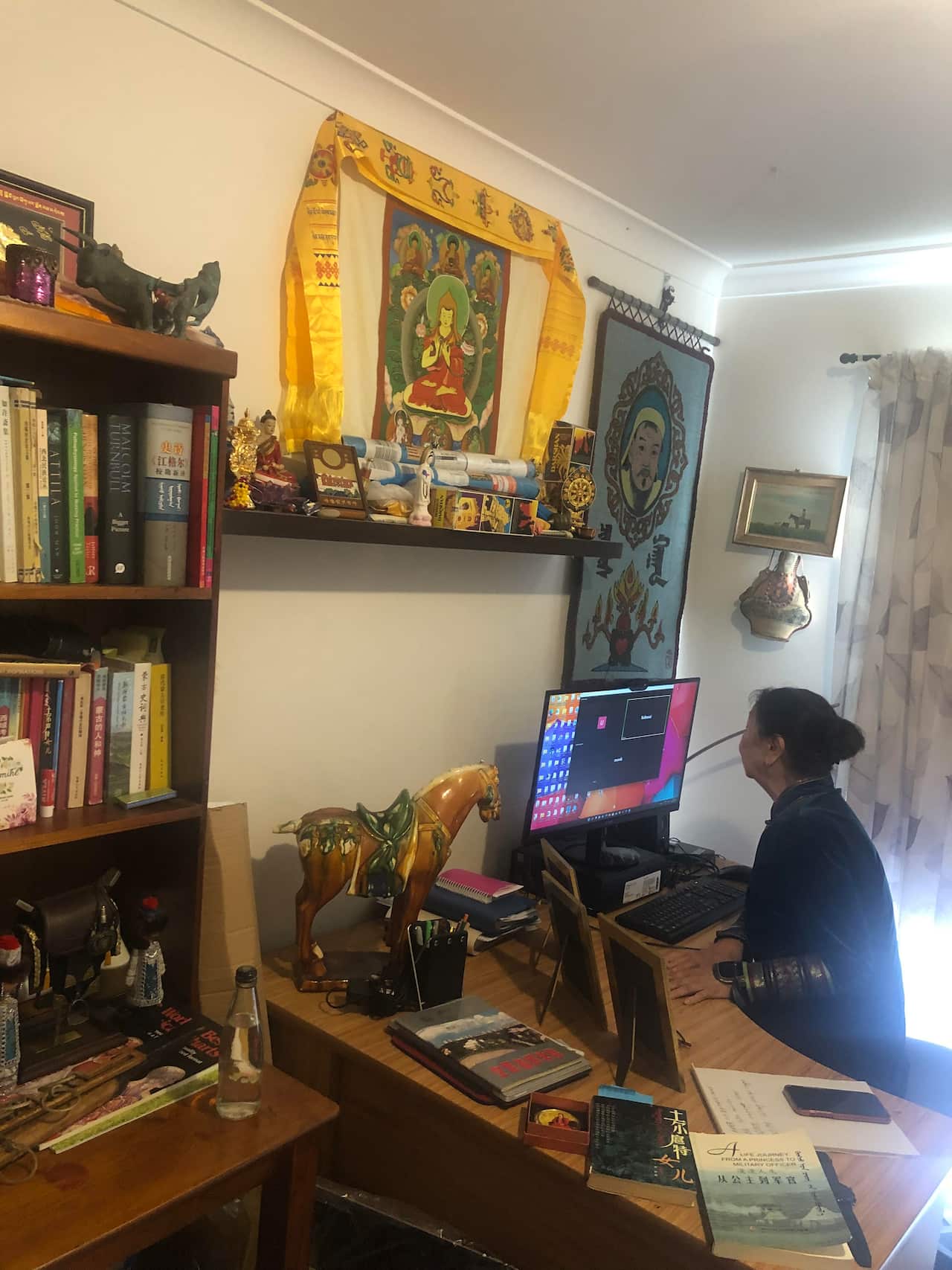 Lin is talking with her mongolian friends online.jpg