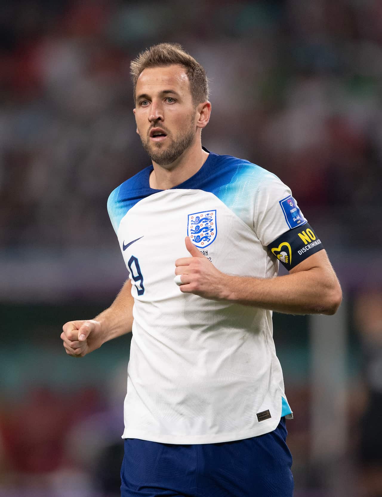 A football player is jogging