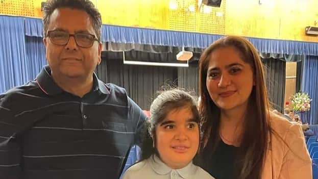 Simra with Parents.jpeg