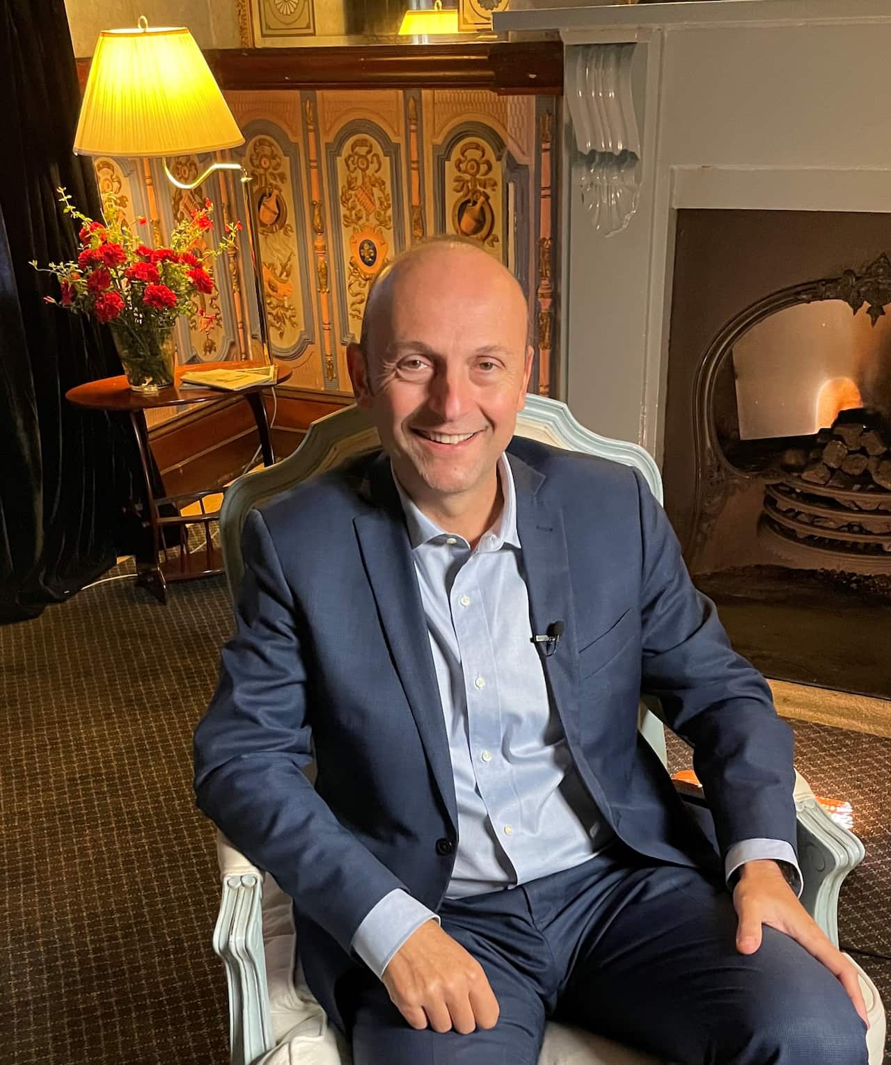 Andrea Comastri in the Hotel Etico lounge room 