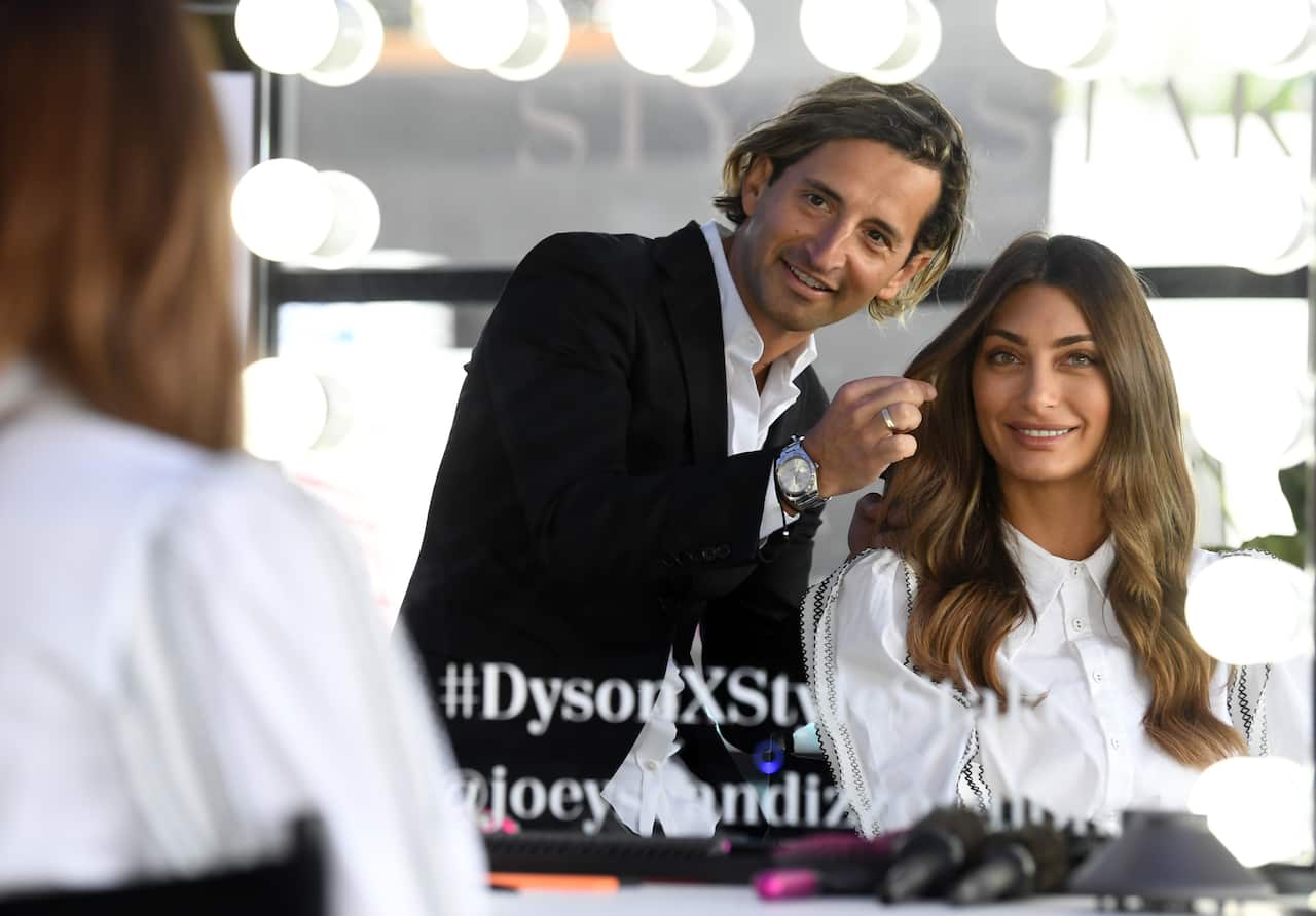 Joey Scandizzo with a client.