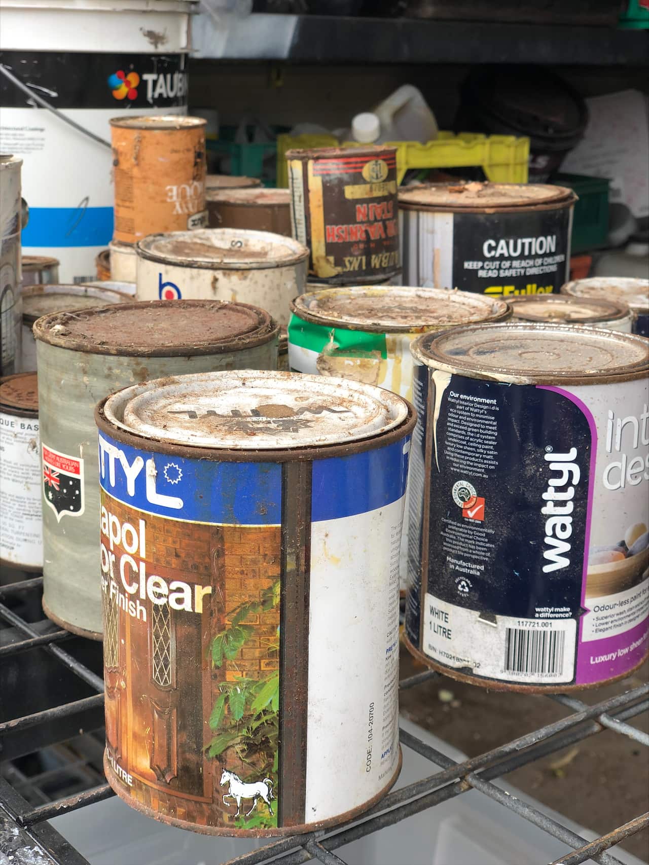 Paint tins ready to be recycled