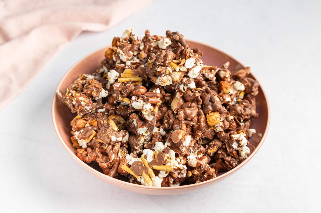Sweet chilli macadamia bark combines popcorn, pretzels, nuts and chocolate.