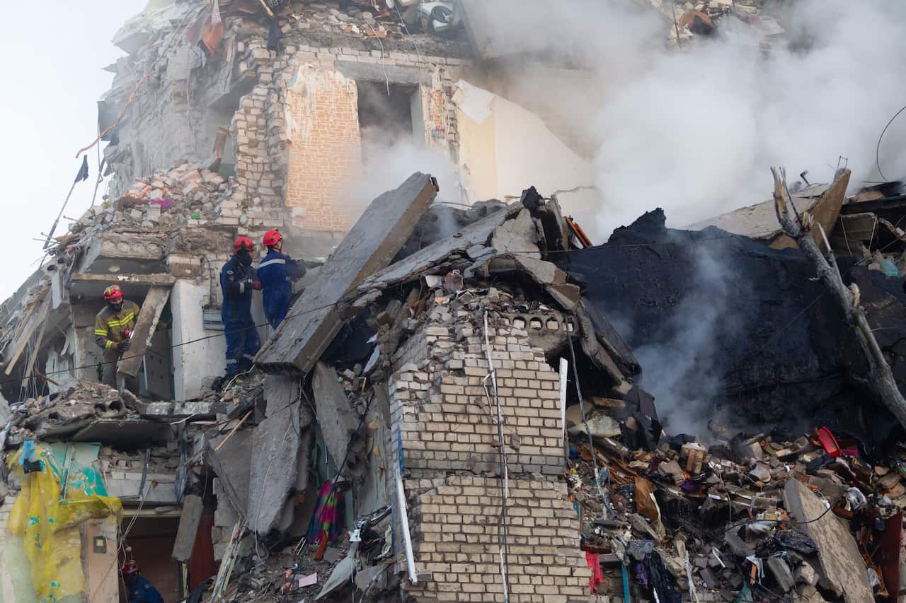 Massive Russian attack on Kyiv destroys part of nine-storey residential building in Darnytskyi district