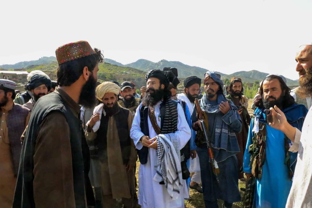 Afghan Minister of Refugees Khalil Ahmad Haqqani (C) visits the earthquake-affected Gayan village in the Paktia province, Afghanistan.