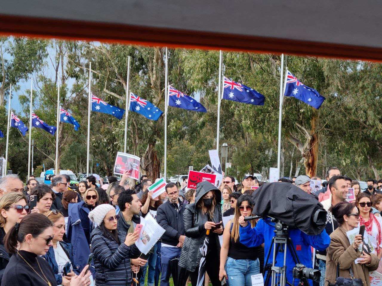 Iranian protesters rally in front of Australian parliament in Canberra