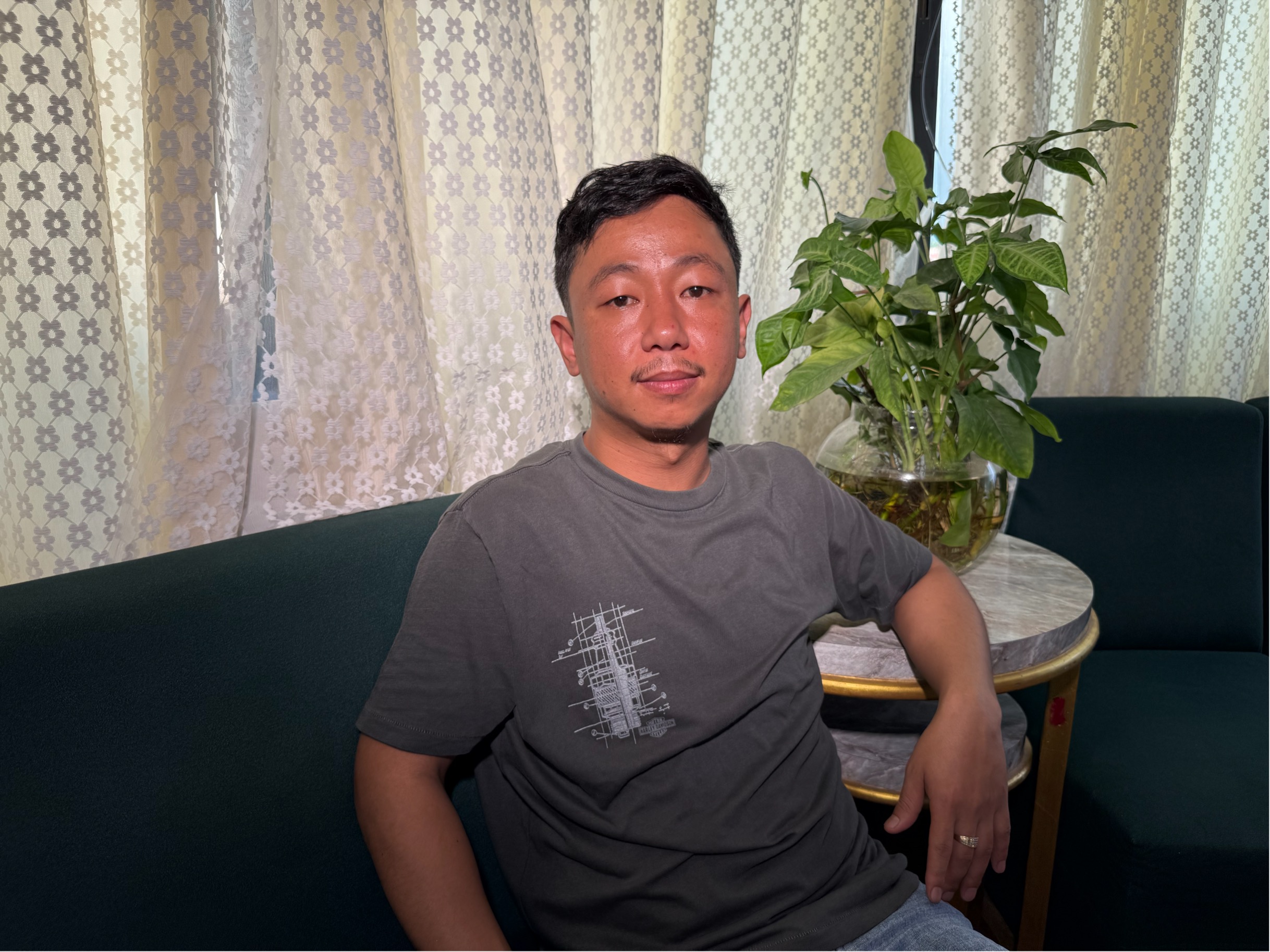 A man sitting on a couch.