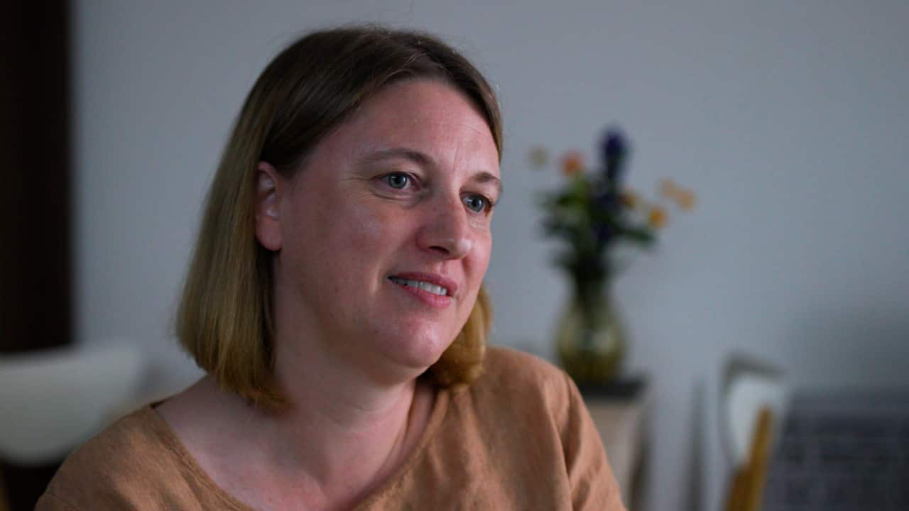 A woman with short hair.