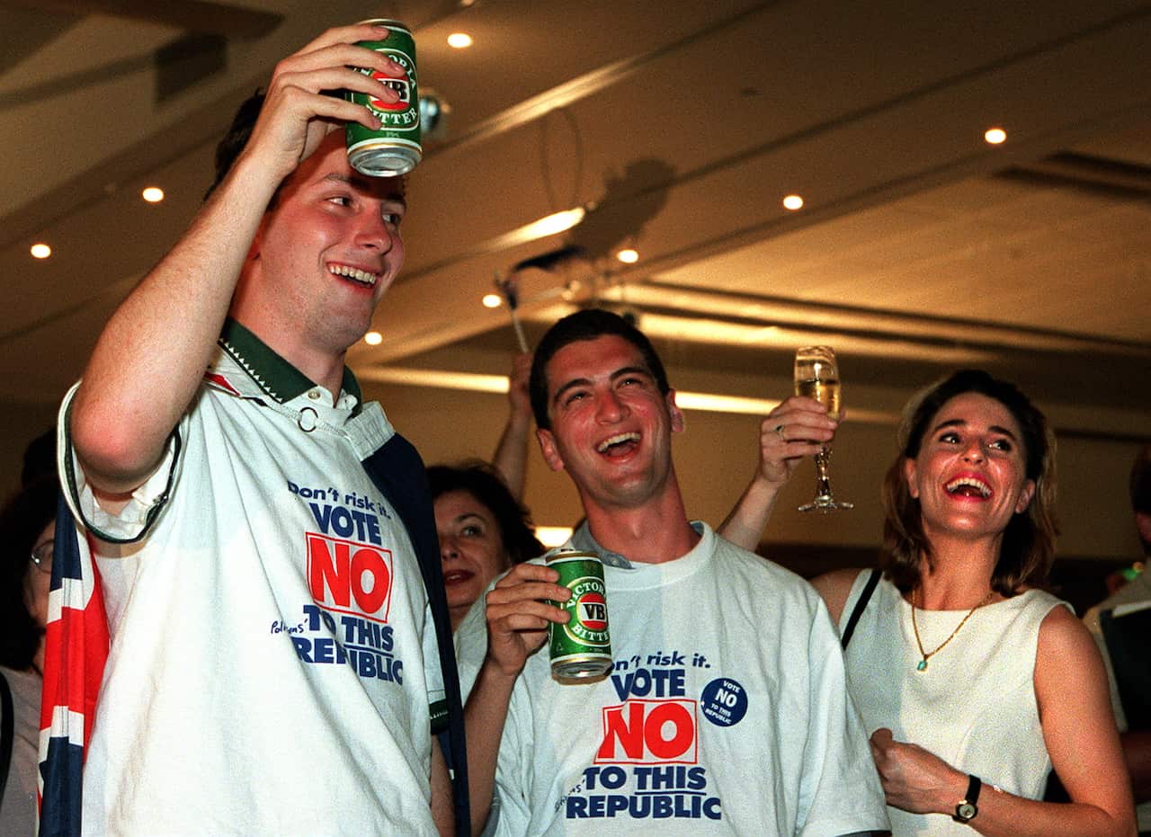 Monarchists celebrate with beers.