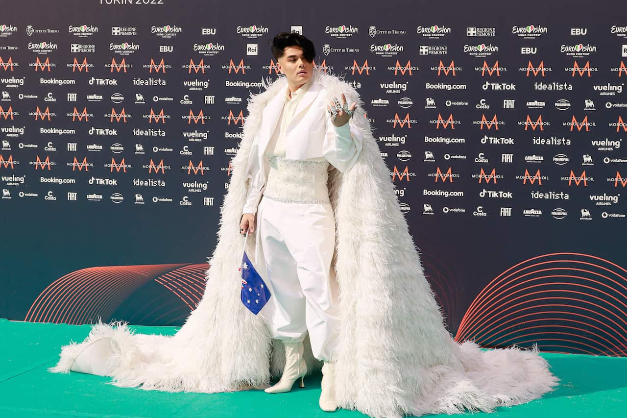 Australia's Sheldon Riley poses in an all-white outfit at the opening ceremony of the Eurovision Song Contest