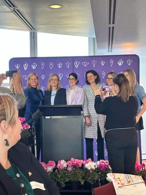 Danielle Snelling (centre) on stage with other special guests at the Parliament House Mother's day event.