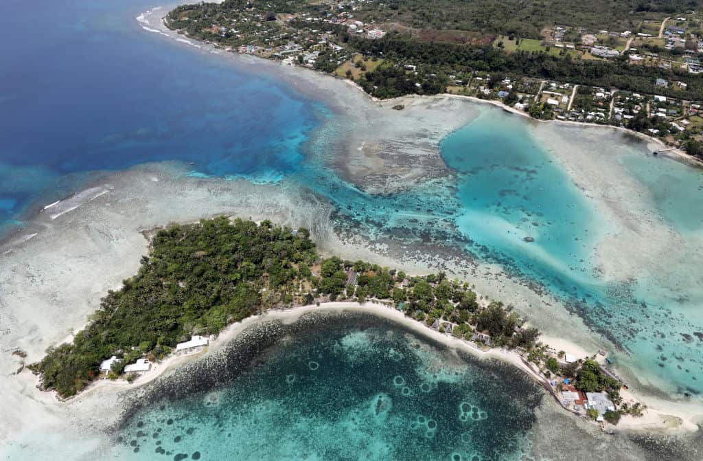 An aerial view of an island and coastline. 