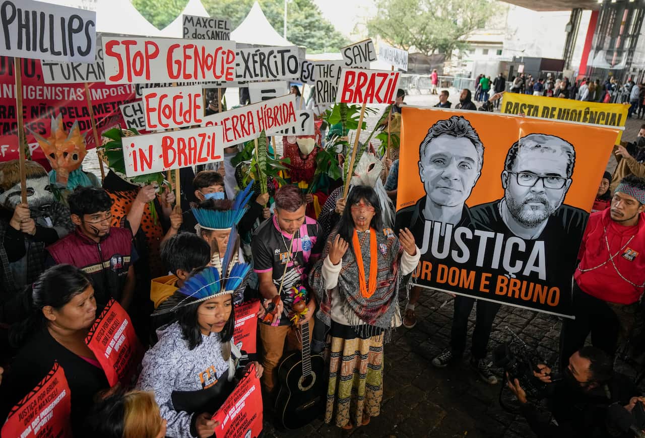 Guarani Indigenous and human rights activists attend a demonstration in support of British journalist Dom Phillips and Indigenous expert Bruno Perreira