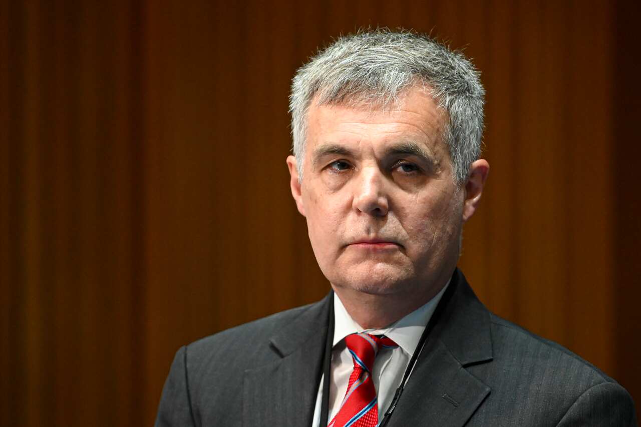 A man wearing a suit and tie.