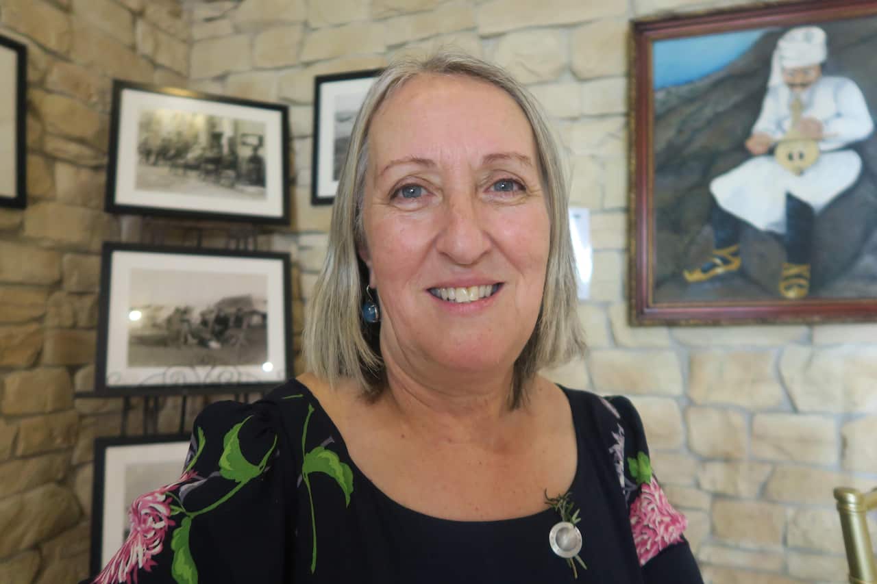 Portrait of woman looking into camera