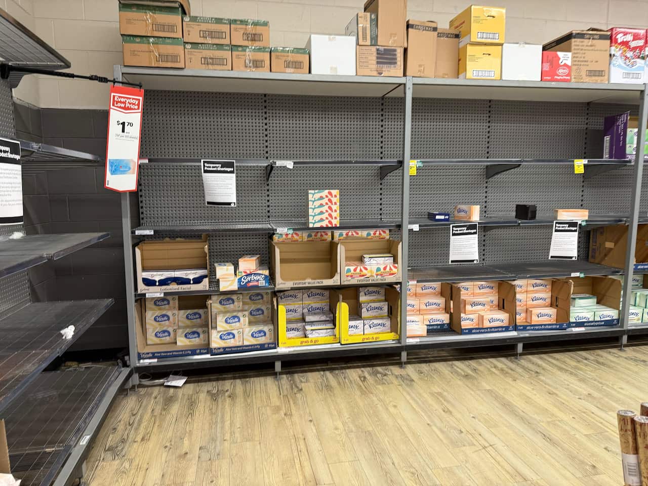 Bare shelves at a Woolworths store