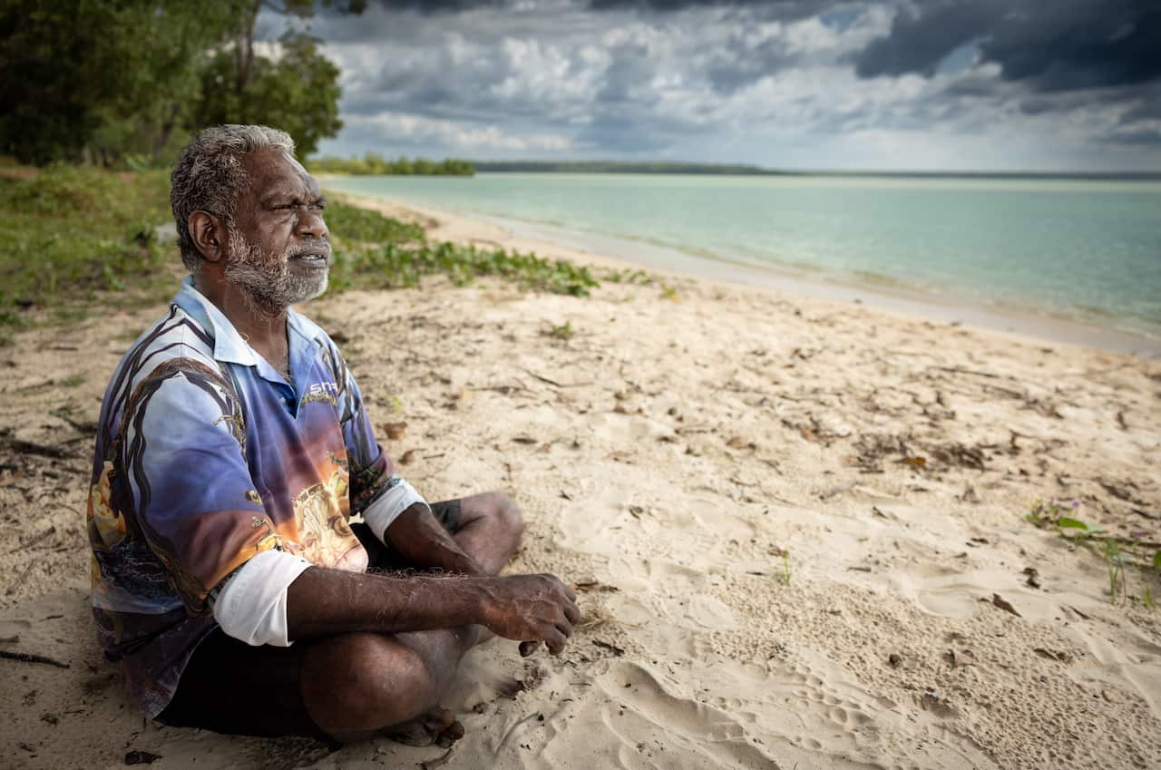 Plaintiff Dennis Tipakallipa sitting on Country.