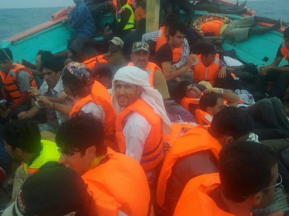 A group of men onboard a boat.
