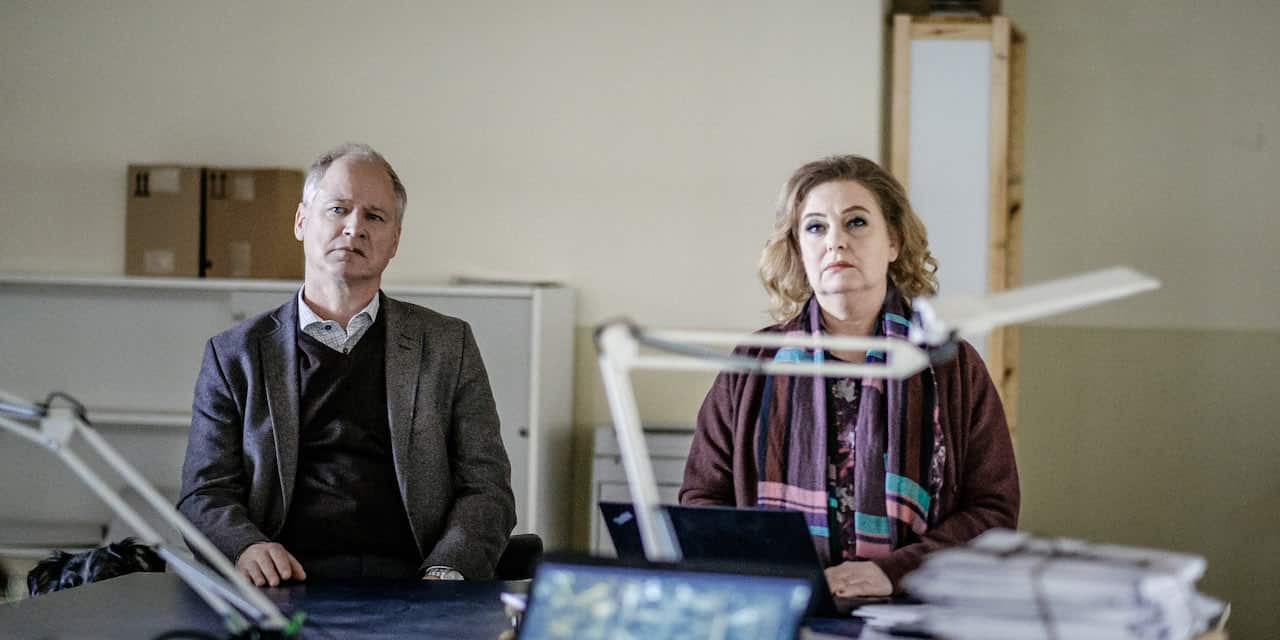 Swedish actors Robert Gustafsson and Ia Langhammer in crime drama series The Truth Will Out. They are seated opposite someone's desk in an office side by side.jpeg