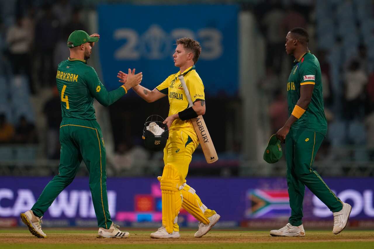 South Africa's Aiden Markram shakes hand with Australia's Josh Hazlewood after South Africa won the ICC Cricket World Cup match against Australia in Lucknow, India on Thursday, 12 October 2023. 