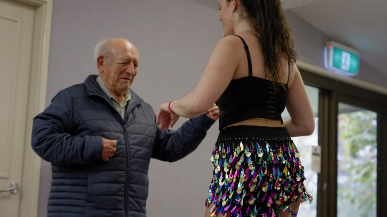 Mario dancing with one of the salsa instructors.
