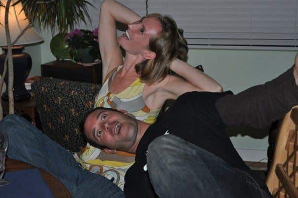 Austin and Janette leaning on each other and laughing. 