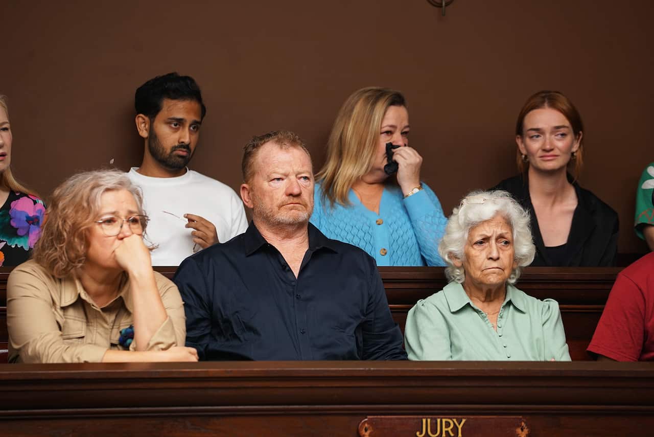 The jury panel in the courtroom