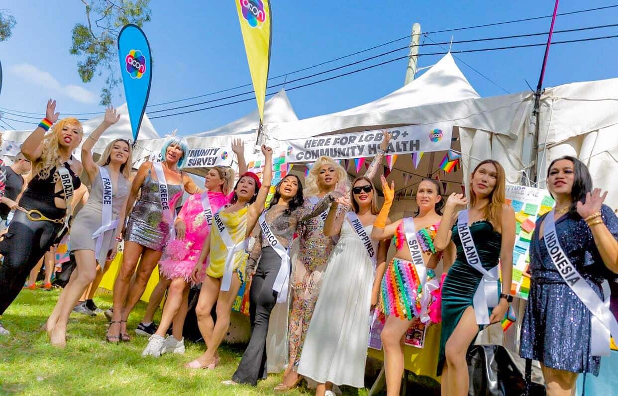 The contestants of a beauty pageant pose for a photo together. 