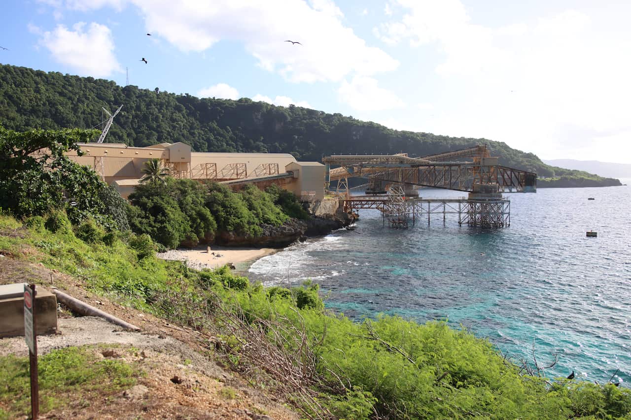 Phosphate mine infrastructure pictured along the coastline