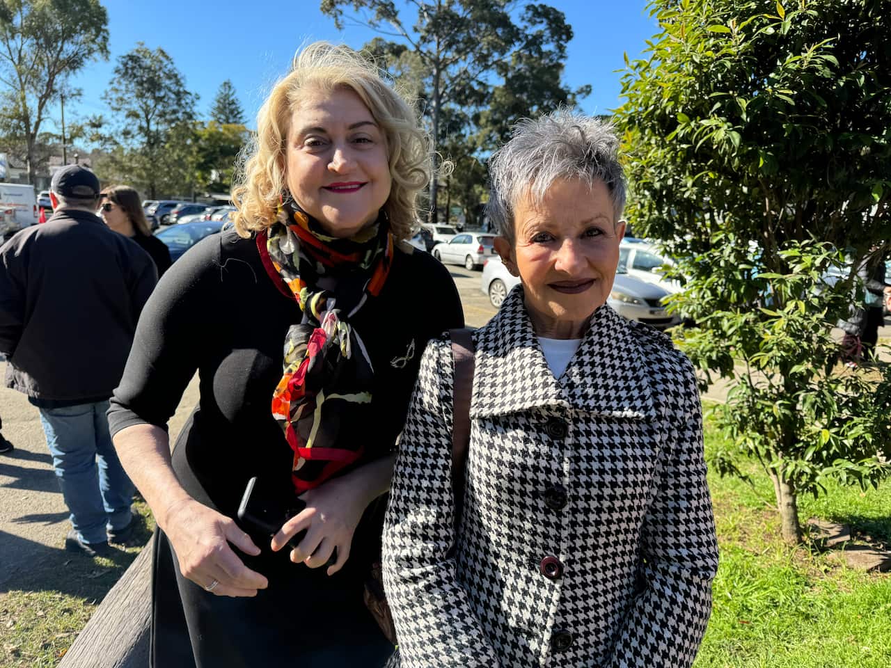 Rosemary and Bruna, two volunteers with an Italian background, part of the community that gravitates around Addi Road.