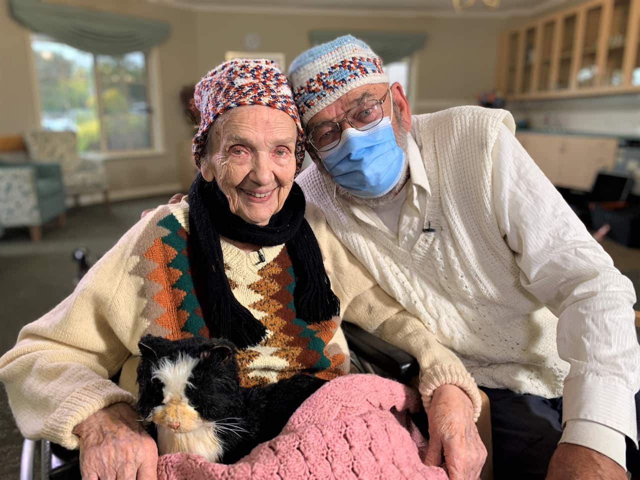 Velta Ozols, 100, with her son Nim, 77.