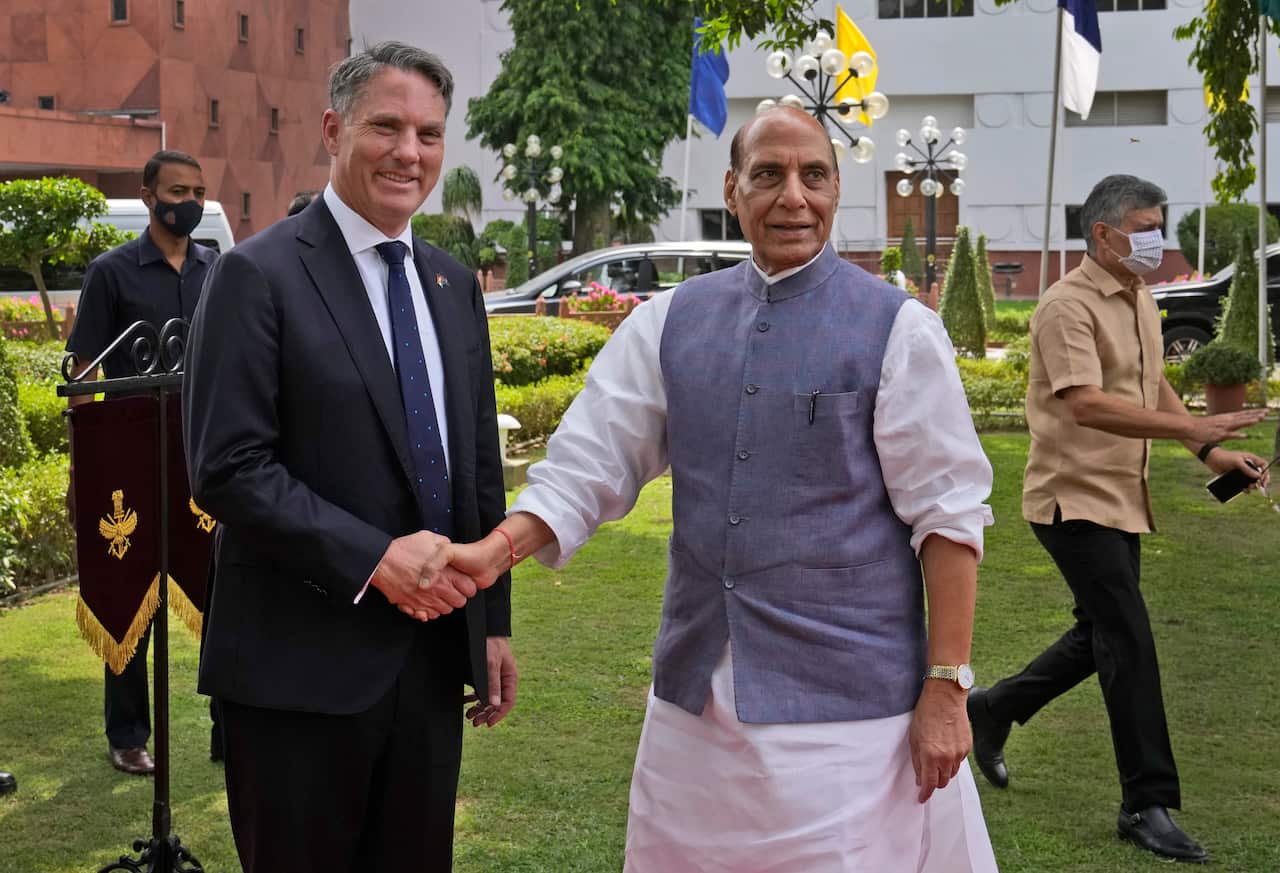 Deputy Prime Minister and Defence Minister Richard Marles poses with Indian Defence Minister Rajnath Singh