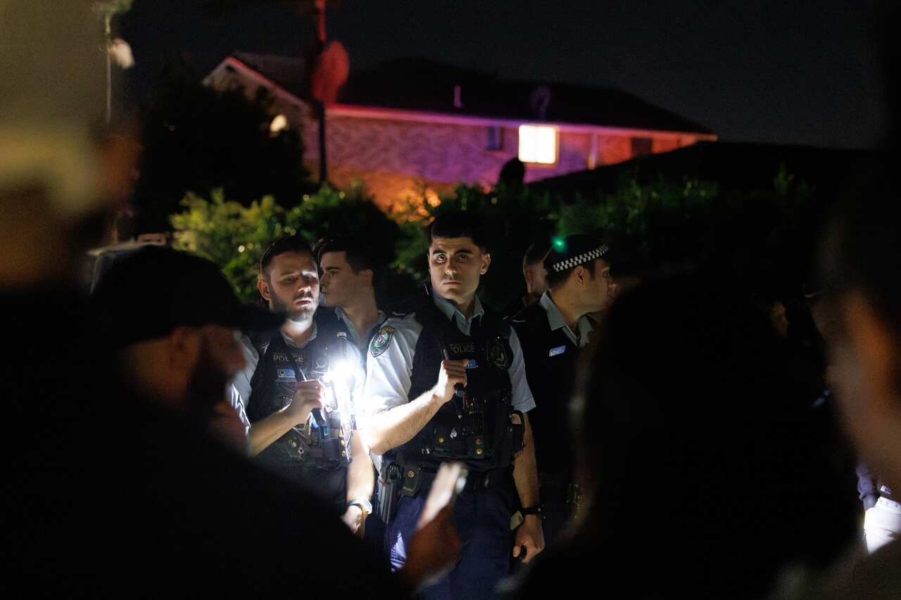 A policeman at the scene of a deadly stabbing