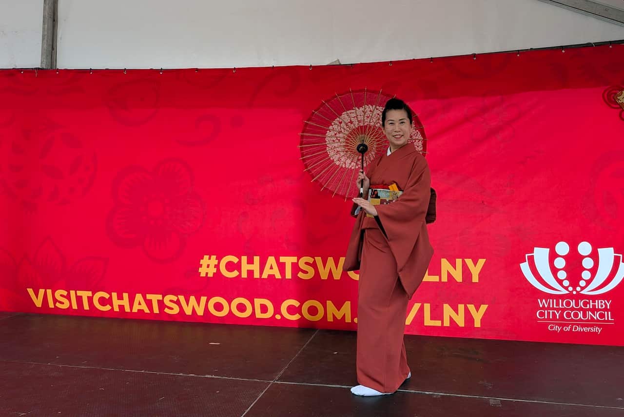 Junko Hirabayashi, Content Producer and Host of SBS Japanese Radio, performing traditional Japanese dance on stage.jpeg
