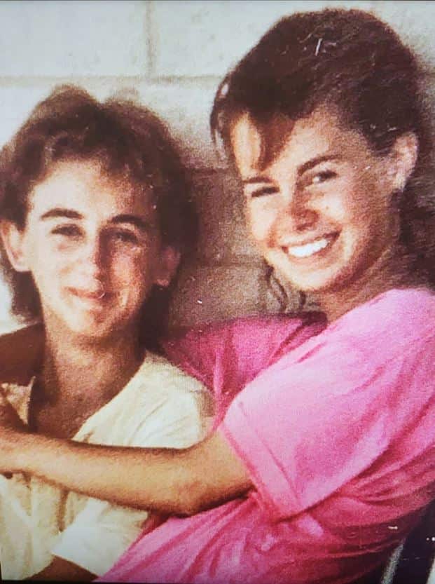 A photo of Darren and Jo embracing and smiling when they started dating at the age of 14.