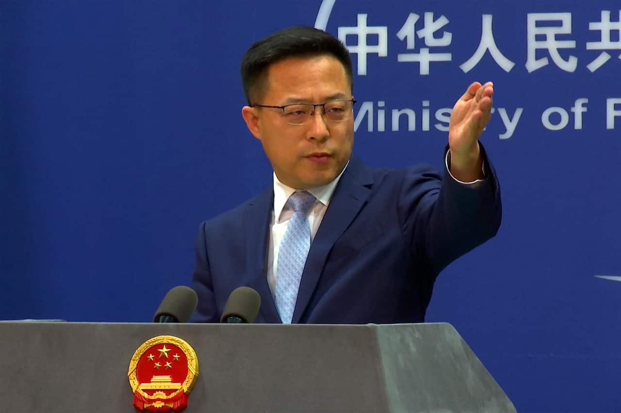 Chinese Foreign Ministry spokesperson Zhao Lijian gestures