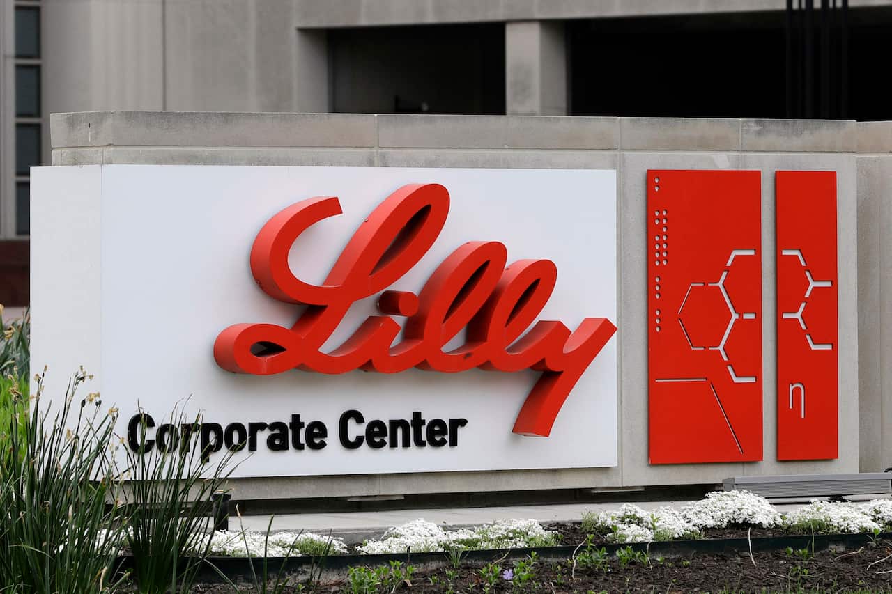 A sign outside a building that reads "Lily Corporate Centre".