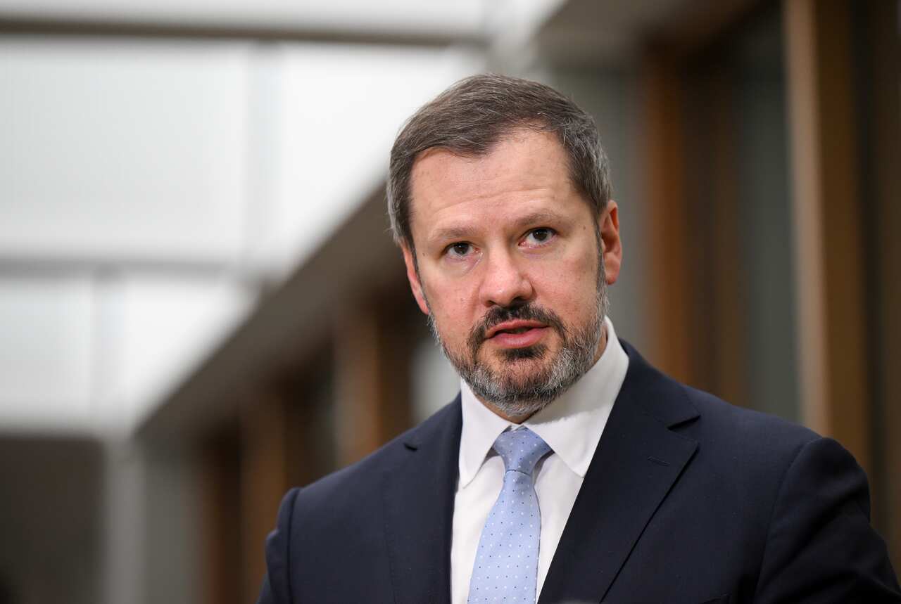 Ed Husic speaking in an open room.