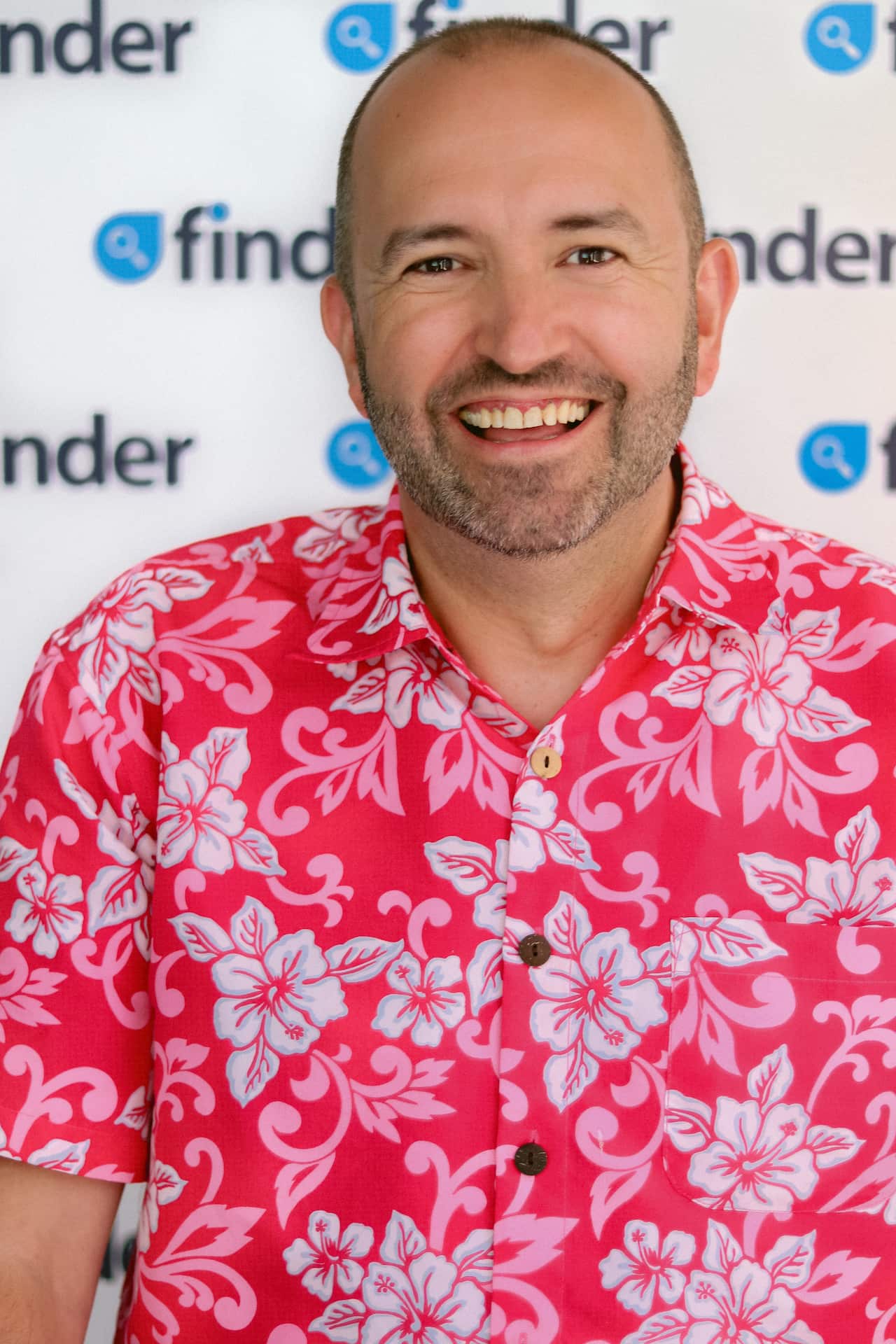 A man wearing a bright coloured shirt.