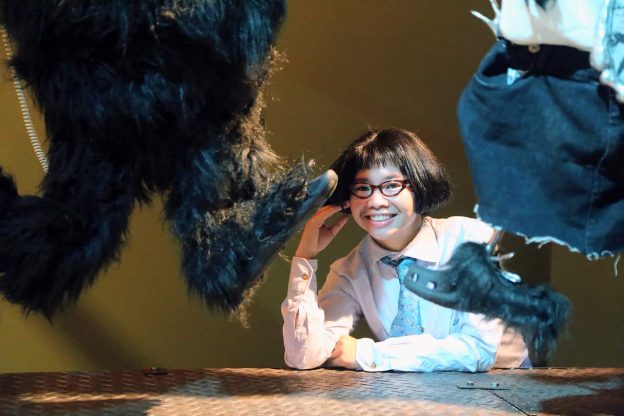 Natasha Tontey with her installation "Primate Visions: Macaque Macabre", which explores the relationship between the Minahasa people and the black macaque known as yaki in North Sulawesi.