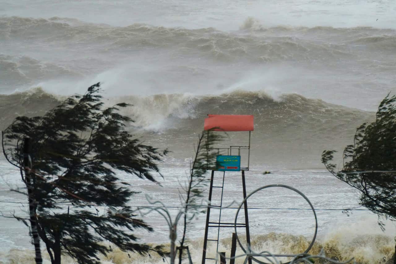 Waves surge ahead of a typhoon making landfall. 
