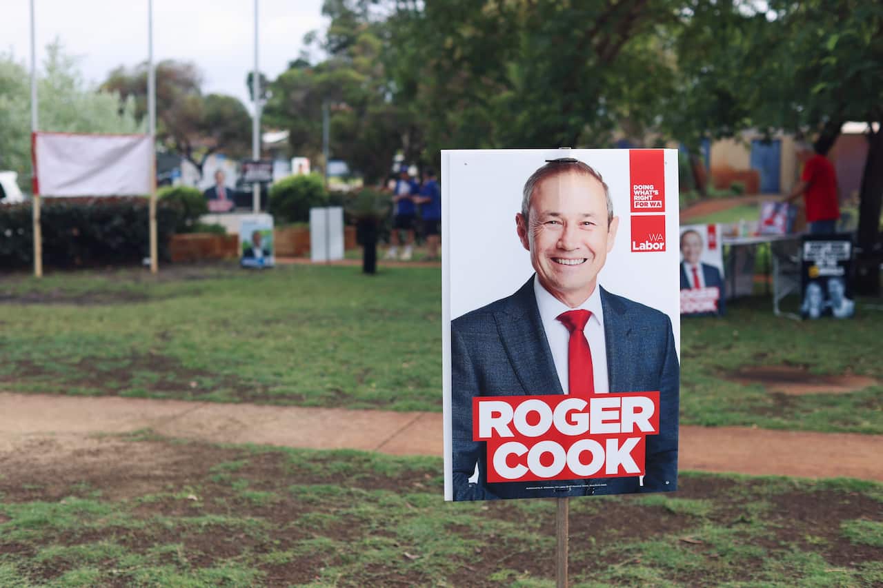 Election signage stuck on a grass on election day. 
