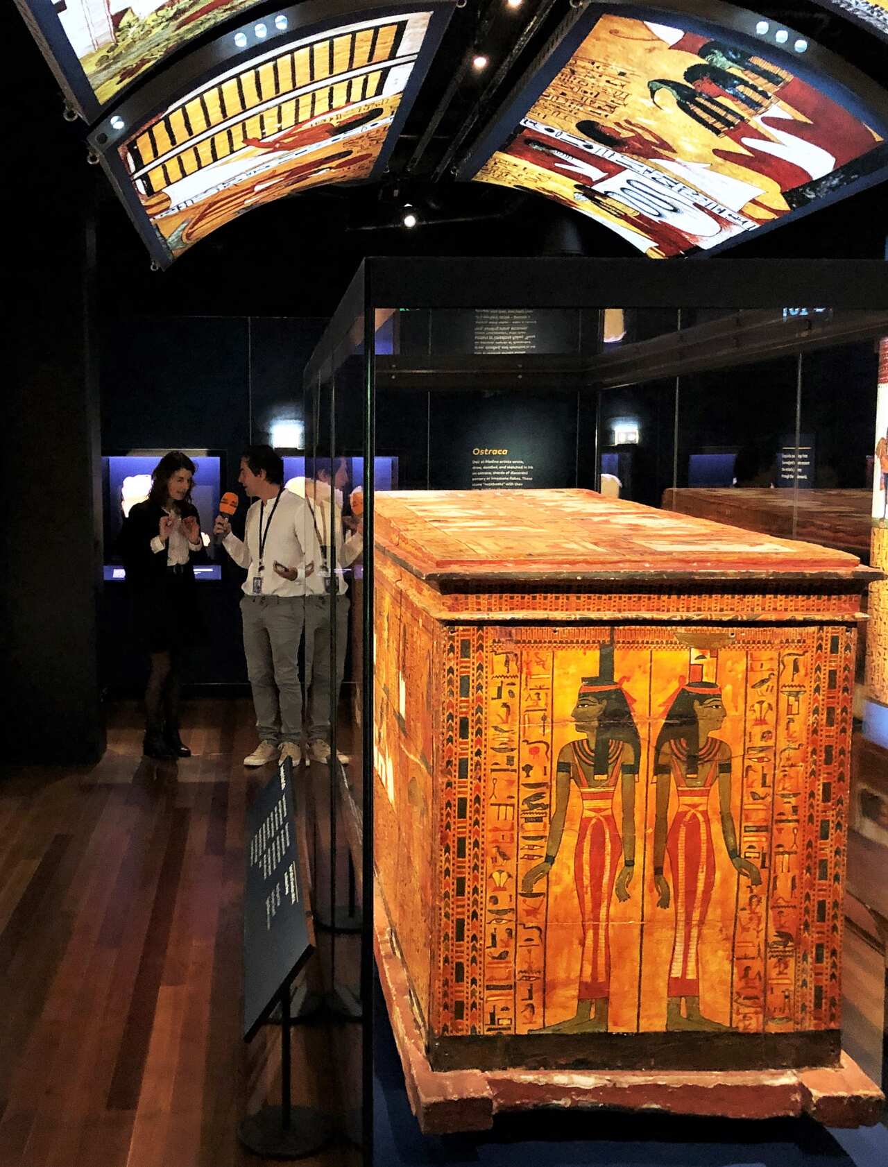Camilla Di Biase-Dyson and Massimiliano Gugole near the sarcophagus of the artist Sennedjem.