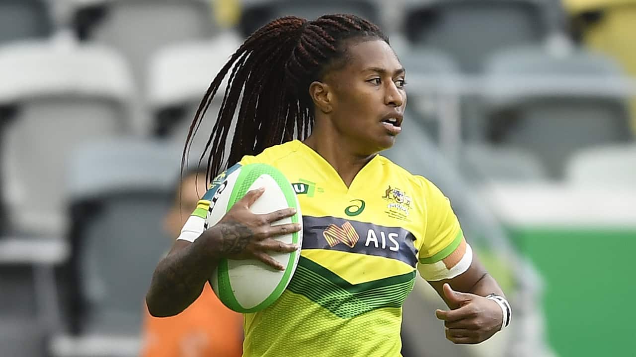 Ellia Green playing rugby for Australia.