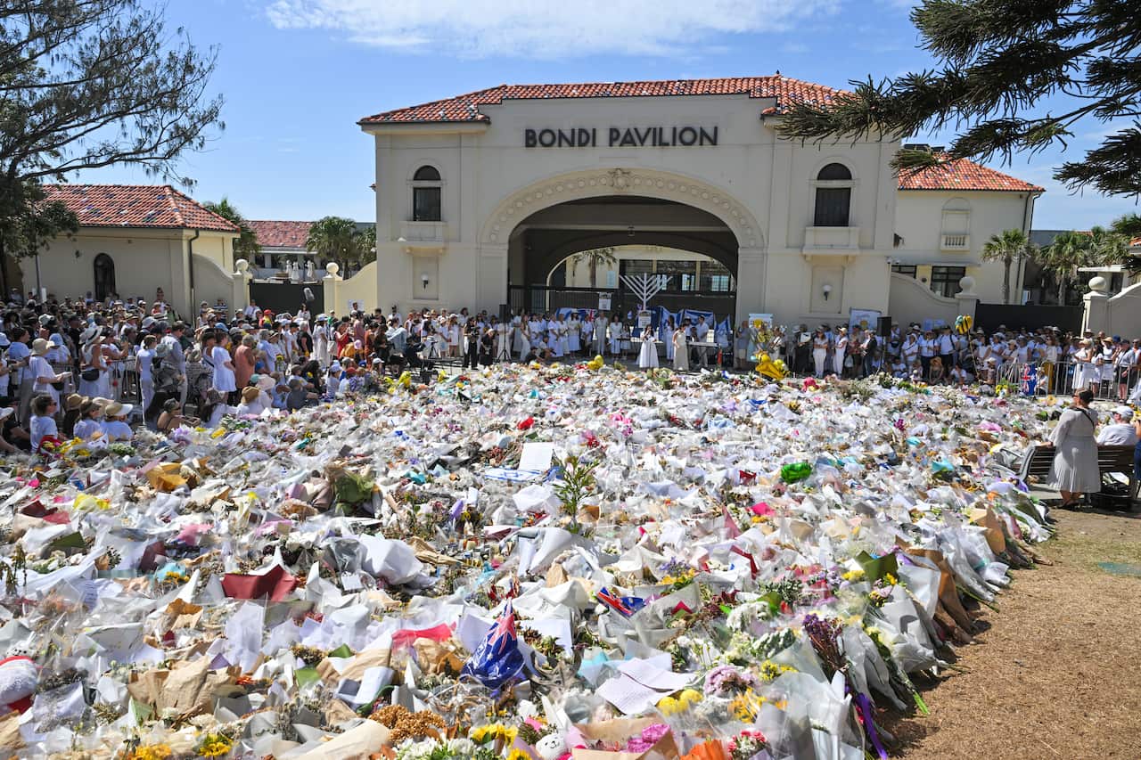 Large sea of floral tributes outside Bondi Pavilion.