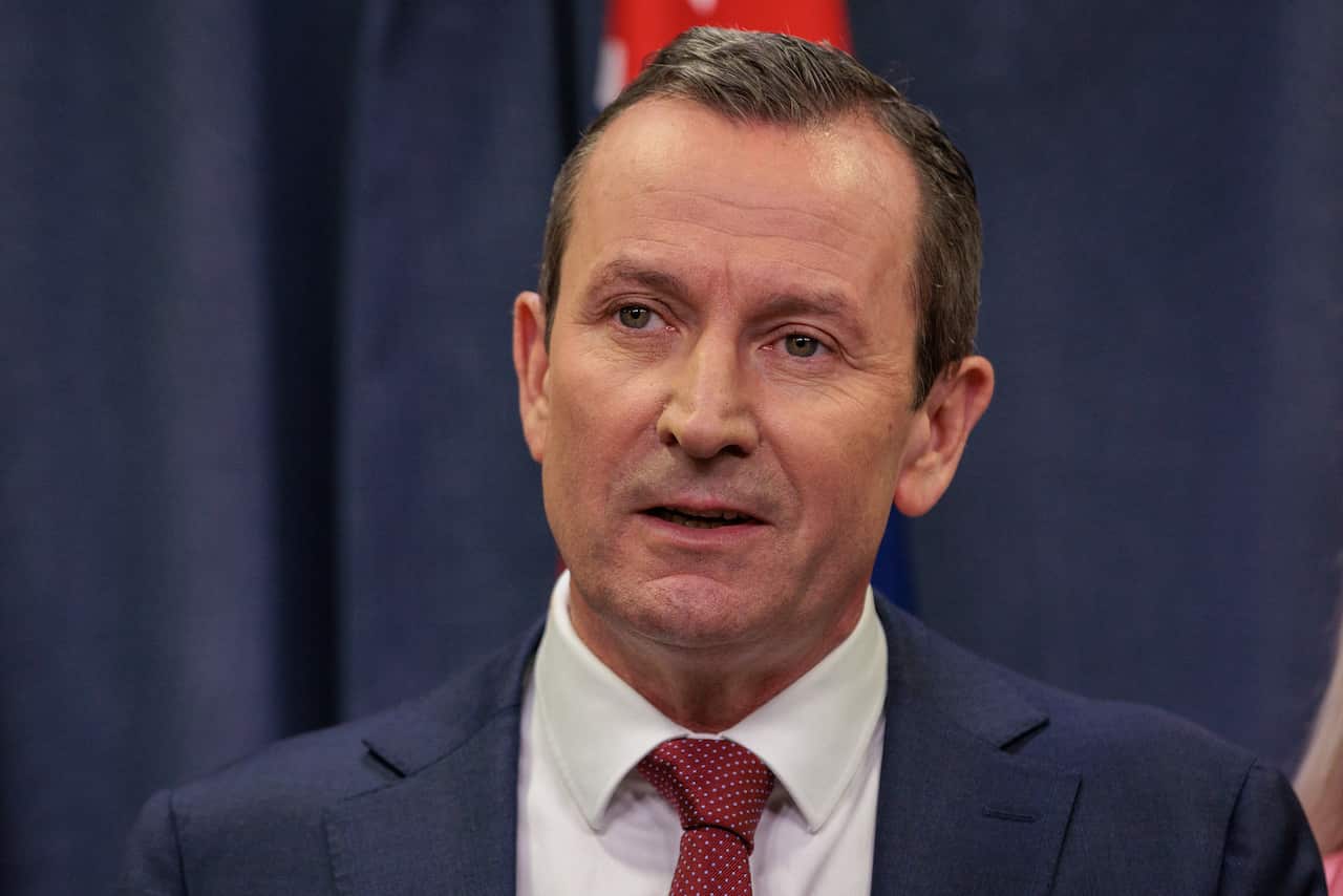 Mark McGowan in a suit and tie