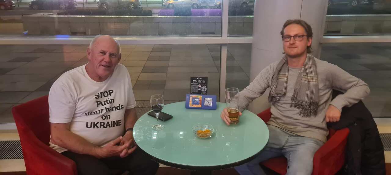 Nick and Stefan sit at a table