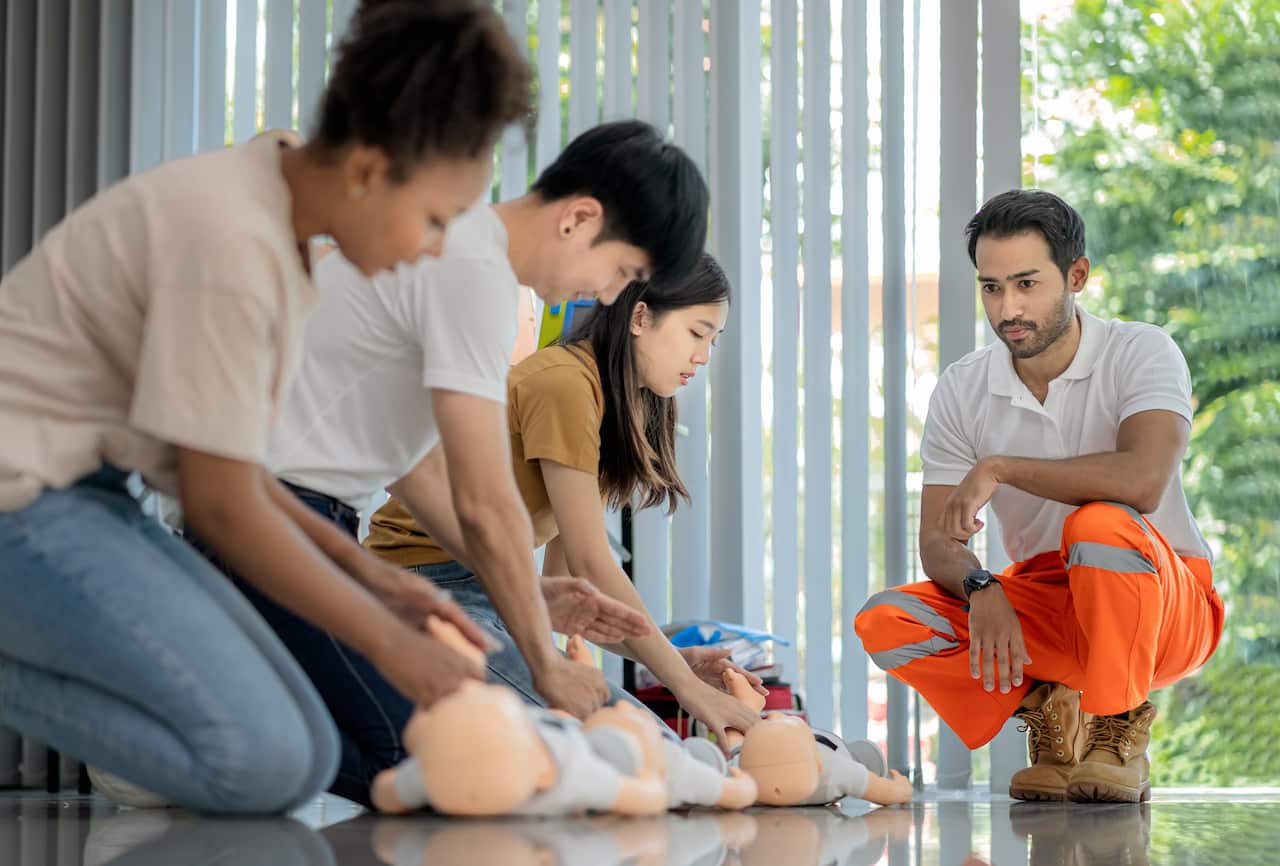 practising with dummy.jpg